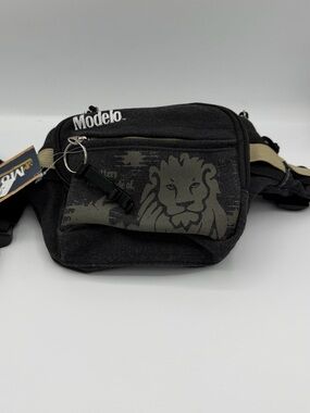 Model Black Canvas Waist Bag with Lion Graphic and Tan Strap Accents